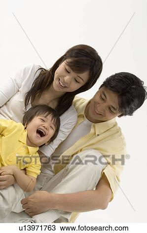 Stock Image - Family with one child. Fotosearch