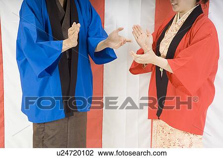 Man and woman clapping hands View Large Photo Image Stock Image - Man and woman clapping hands. Fotosearch