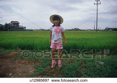 Girl standing on tiptoe View Large Photo Image Stock Photo - Girl standing on tiptoe. Fotosearch