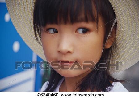 Girl wearing straw hat View Large Photo Image Stock Image - Girl wearing straw hat. Fotosearch