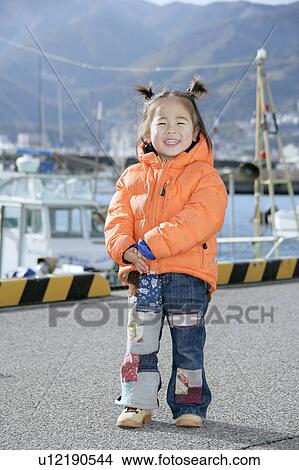 Picture - Portrait of a girl smiling. Fotosearch