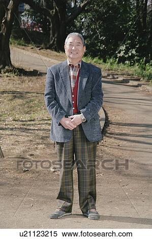 Stock Photography - Portrait of a senior man standing. Fotosearch