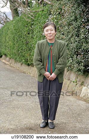 Stock Image - Portrait of a senior woman smiling. Fotosearch