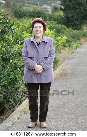 Stock Photo - Portrait of a senior woman smiling. Fotosearch