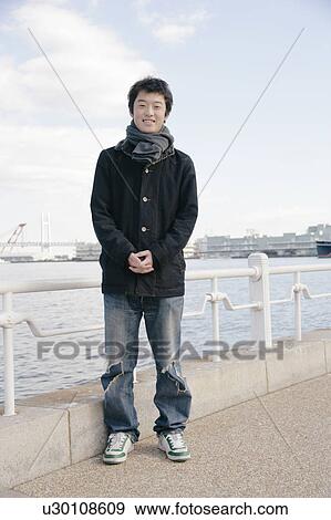 Portrait of a young man View Large Photo Image Stock Photo - Portrait of a young man. Fotosearch