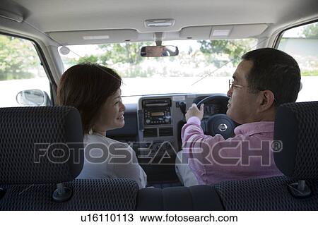 Mature couple in car View Large Photo Image Stock Image - Mature couple in car. Fotosearch
