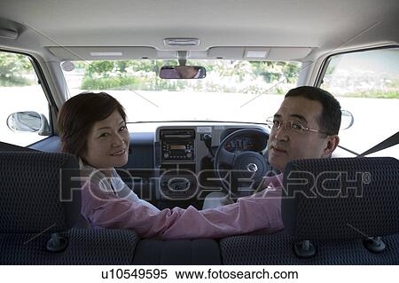 Stock Photography - Mature couple in car. Fotosearch