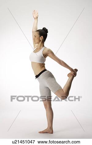Stock Photo - View of a woman doing exercise. Fotosearch