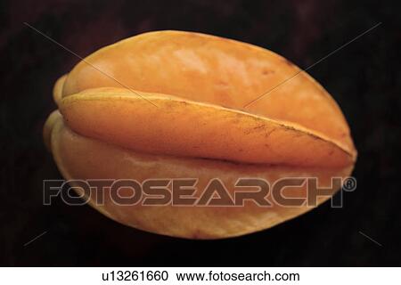 Close-up of a star fruit View Large Photo Image Stock Image - Close-up of a star fruit. Fotosearch