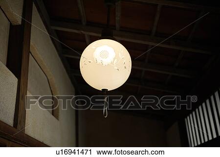 Low angle view of a designed lamp View Large Photo Image Stock Image - Low angle view of a designed lamp. Fotosearch