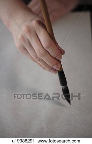 Person painting on a canvas View Large Photo Image Stock Image - Person painting on a canvas. Fotosearch