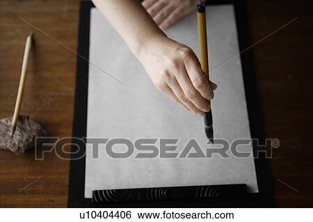 Person painting on a canvas View Large Photo Image Stock Photograph - Person painting on a canvas. Fotosearch