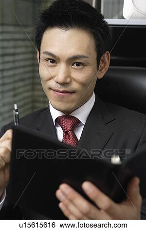 Businessman, close-up View Large Photo Image Stock Photograph - Businessman, close-up. Fotosearch