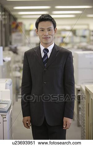 Businessman smiling, portrait View Large Photo Image Stock Image - Businessman smiling, portrait. Fotosearch