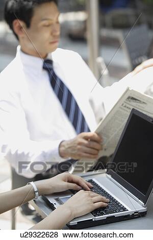 Businessman reading newspaper, portrait View Large Photo Image Stock Photo - Businessman reading newspaper, portrait. Fotosearch