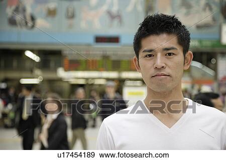 Stock Photo - Close-up of a young man. Fotosearch