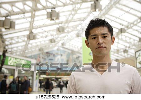Close-up of a young man View Large Photo Image Stock Photography - Close-up of a young man. Fotosearch