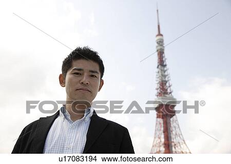 Portrait of a smiling young man View Large Photo Image Picture - Portrait of a smiling young man. Fotosearch
