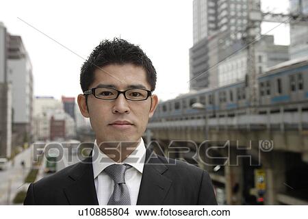 Picture - Portrait of a young businessman. Fotosearch