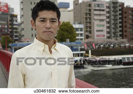 Portrait of a young man View Large Photo Image Stock Image - Portrait of a young man. Fotosearch