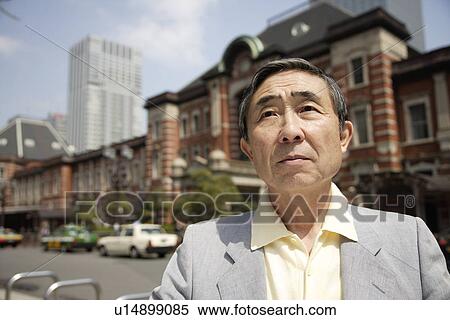 Stock Photography - Close-up of a contemplative senior man. Fotosearch