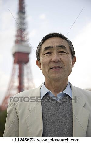 Stock Image - Portrait of a smiling senior man. Fotosearch