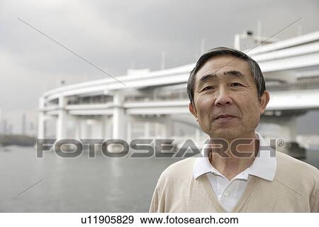 Stock Photo - Portrait of a smiling senior man. Fotosearch
