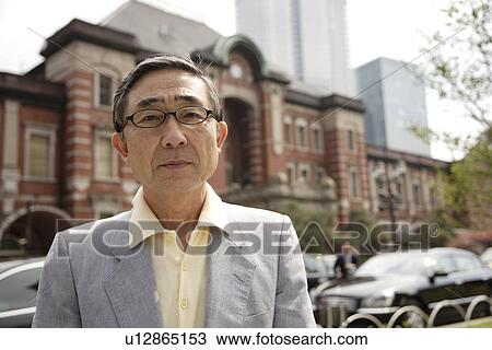Stock Image - Portrait of serious senior man. Fotosearch