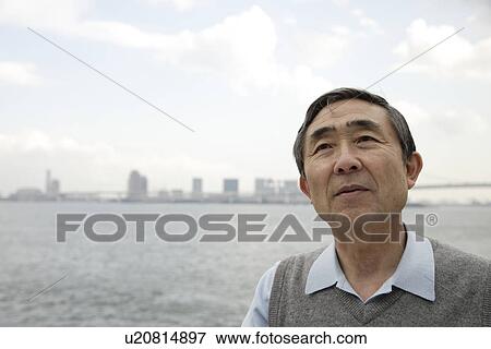 Stock Photo - View of a contemplative senior man. Fotosearch