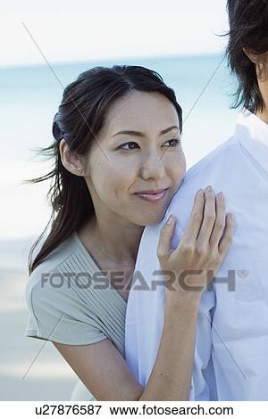 A couple standing together View Large Photo Image Stock Photo - A couple standing together. Fotosearch