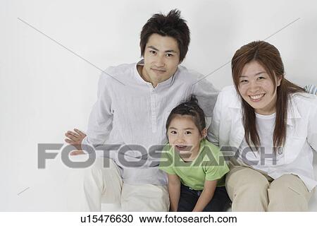 A young couple with a girl View Large Photo Image Stock Image - A young couple with a girl. Fotosearch