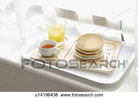 Pancake on a tray View Large Photo Image Stock Photo - Pancake on a tray. Fotosearch