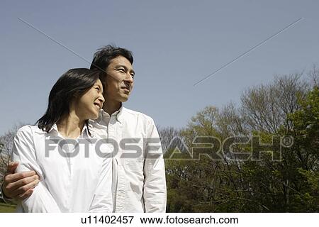 Stock Photo - A young couple smiling. Fotosearch