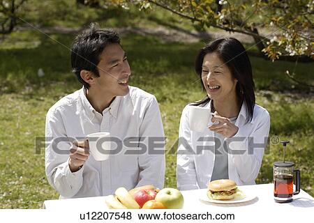 Stock Photo - Husband and wife having breakfast. Fotosearch