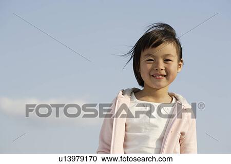 Portrait of a girl smiling View Large Photo Image Stock Image - Portrait of a girl smiling. Fotosearch
