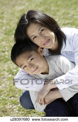 Portrait of mother and son enjoying View Large Photo Image Stock Image - Portrait of mother and son enjoying. Fotosearch