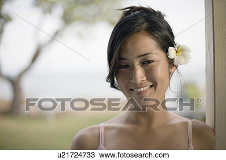 A young woman smiling View Large Photo Image Stock Image - A young woman smiling. Fotosearch