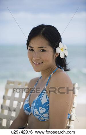 A young woman smiling View Large Photo Image Stock Photograph - A young woman smiling. Fotosearch