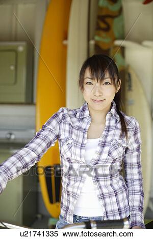 Portrait of a smiling woman View Large Photo Image Stock Photography - Portrait of a smiling woman. Fotosearch