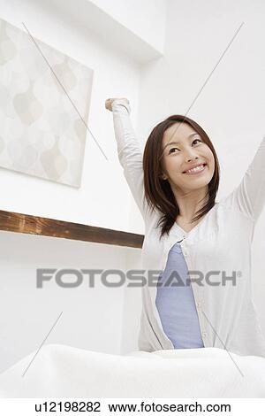 View of a cheerful woman View Large Photo Image Stock Image - View of a cheerful woman. Fotosearch