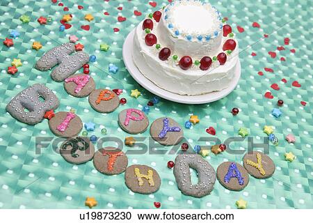 Stock Image - High angle view of a birthday cake. Fotosearch