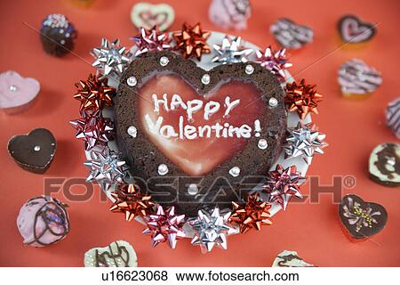 High angle view of a heart-shaped cake View Large Photo Image Stock Photo - High angle view of a heart-shaped cake. Fotosearch