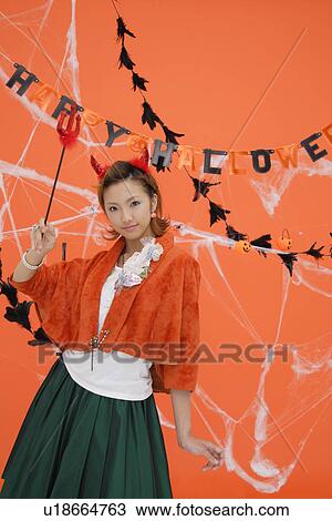 Portrait of a teenage girl with a trident View Large Photo Image Stock Image - Portrait of a teenage girl with a trident. Fotosearch
