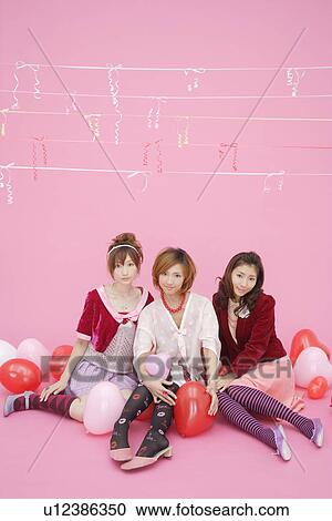 Stock Image - Portrait of teenage girls. Fotosearch