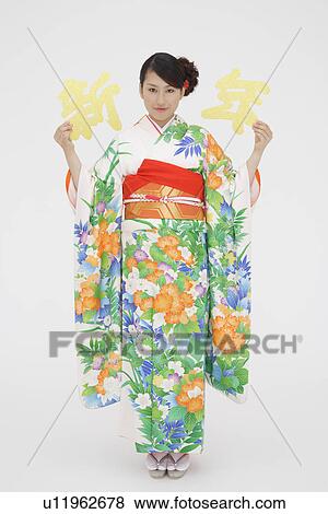 Stock Photo - Portrait of a teenage girl in traditional outfit. Fotosearch