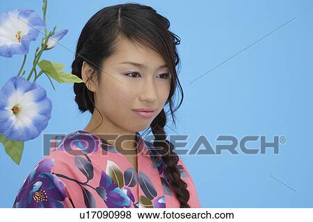 Stock Photo - Portrait of a teenage girl in traditional outfit. Fotosearch