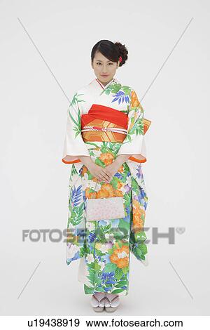 Stock Photo - Portrait of a teenage girl in traditional outfit. Fotosearch