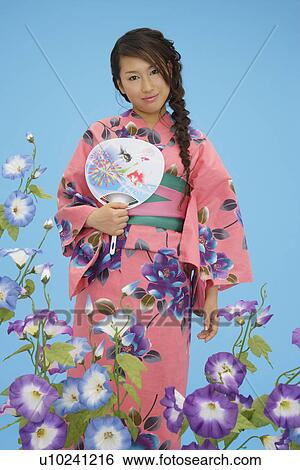 Portrait of a teenage girl in traditional outfit View Large Photo Image Stock Photograph - Portrait of a teenage girl in traditional outfit. Fotosearch