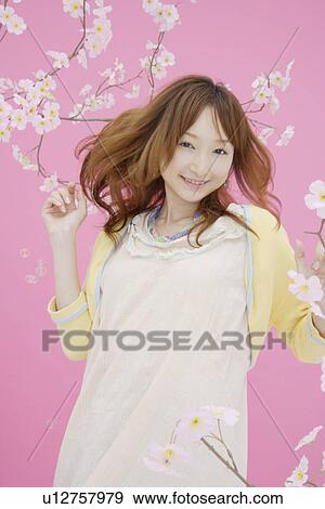 Stock Photo - Portrait of a teenage girl. Fotosearch