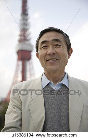 Portrait of a businessman smiling View Large Photo Image Picture - Portrait of a businessman smiling. Fotosearch